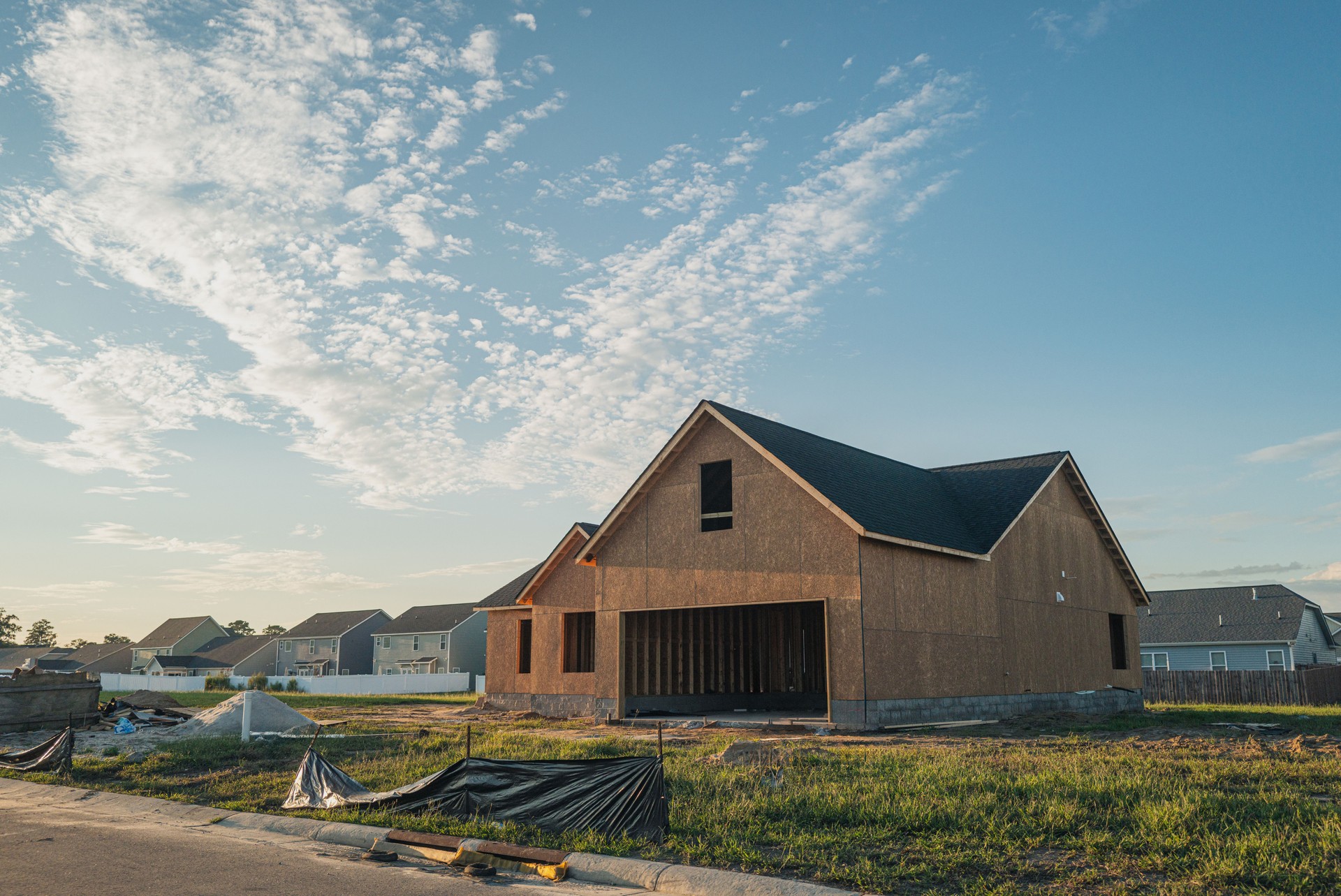 New Construction Home - Housing Development - Construction Site - Low Angle